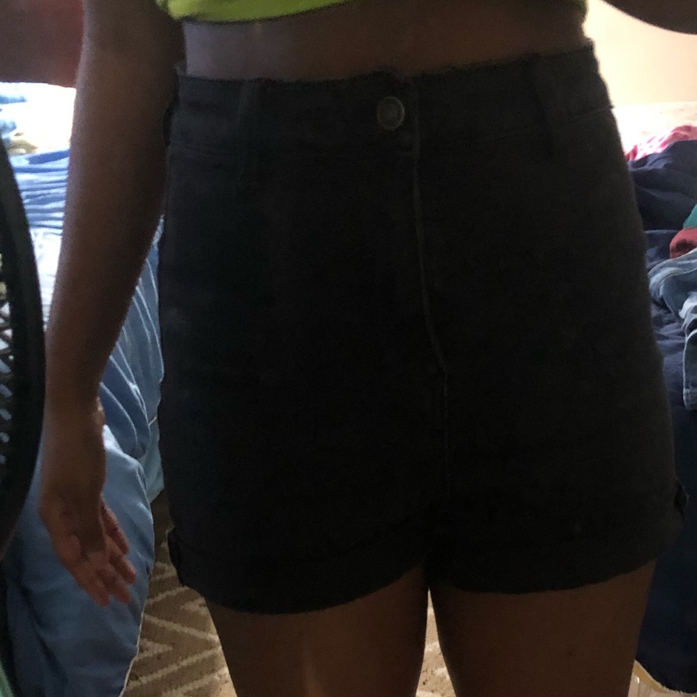 High waisted shorts with paint stains on the butt